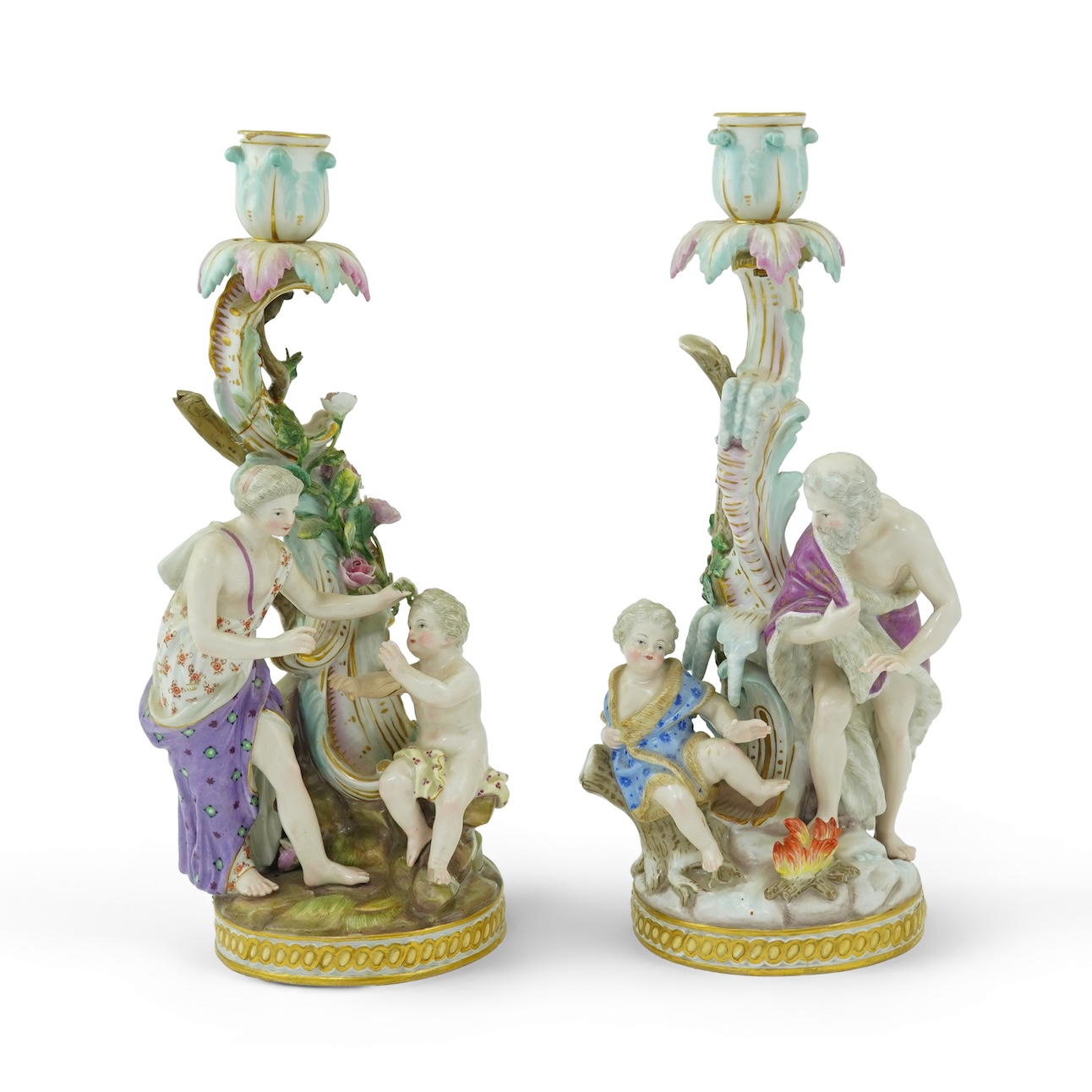 A near pair of Meissen figural candlesticks, late 19th century